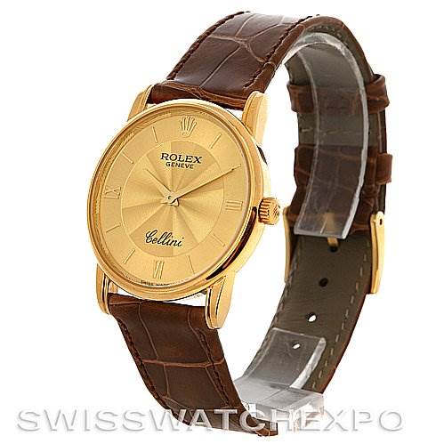 The image shows a Rolex Cellini 5116 Yellow Gold Champagne Dial 5116 Yellow Gold Champagne Dial watch at a three-quarter angle, highlighting the gold dial, brown leather strap, and crown.