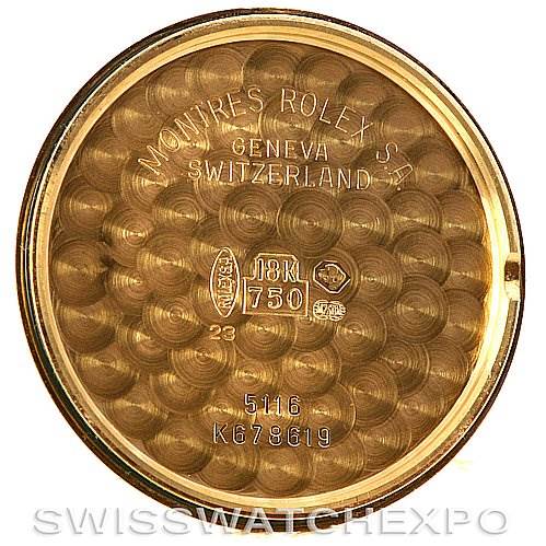 This image shows the inside case back of a Rolex Cellini 5116 Yellow Gold Champagne Dial 5116 Yellow Gold Champagne Dial watch, displaying various inscriptions and gold markings.