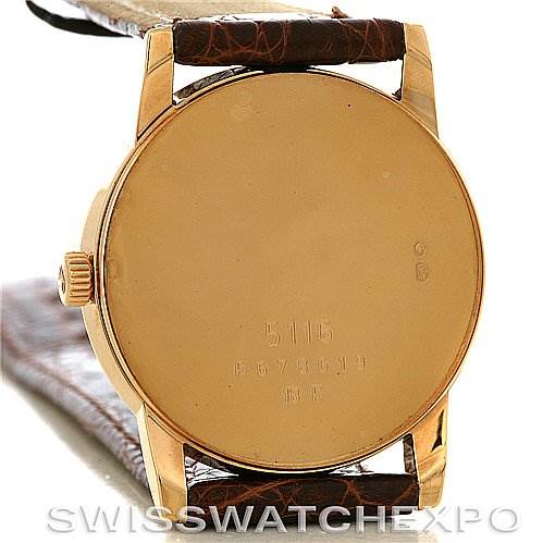 This image shows the back of the Rolex Cellini 5116 Yellow Gold Champagne Dial 5116 Yellow Gold Champagne Dial watch with a closeup of its case back, crown, and a portion of the leather strap.