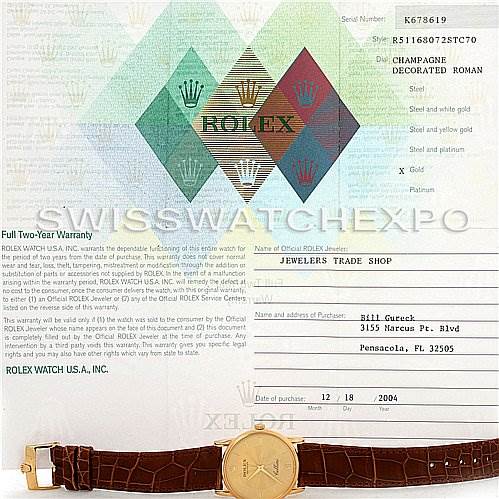 The image shows a top-down view of a Rolex Cellini 5116 Yellow Gold Champagne Dial 5116 Yellow Gold Champagne Dial watch and its warranty card.