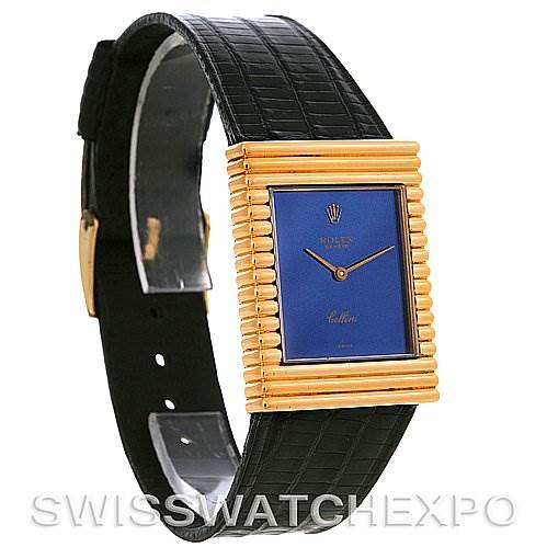 This image shows the Rolex Cellini 4012 Men's Yellow Gold Blue Dial 4012 Men's Yellow Gold Blue Dial watch from an angled front view, highlighting its gold rectangular case and black leather strap.