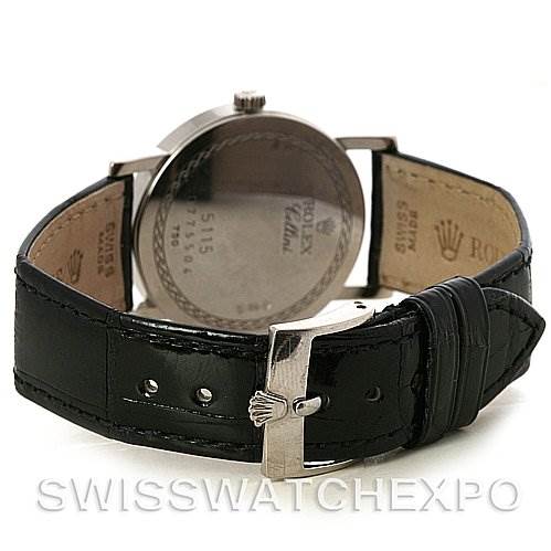 The image shows the back side of a Rolex Cellini 5115 White Gold Silver Dial 5115 White Gold Silver Dial watch with a black leather strap and an open clasp.