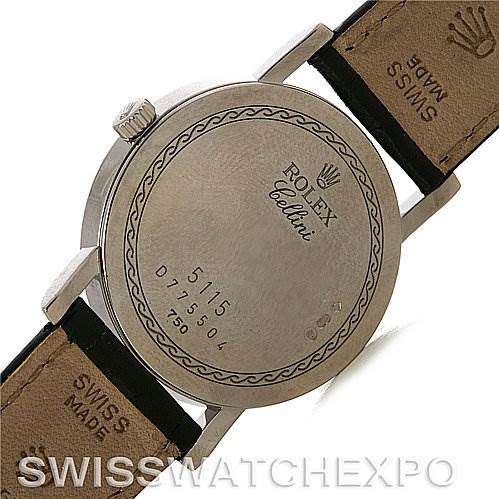 The image shows the back case and part of the leather strap of a Rolex Cellini 5115 White Gold Silver Dial 5115 White Gold Silver Dial watch at an oblique angle.