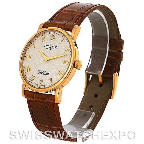 The image shows a Rolex Cellini 5115 Men's Yellow Gold Beige Dial 5115 Men's Yellow Gold Beige Dial watch at a three-quarter view, highlighting its face, gold-tone case, and brown leather strap.