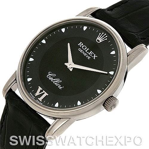This image shows a Rolex Cellini 5116 White Gold Black Dial 5116 White Gold Black Dial model watch at an oblique angle, highlighting the watch face, crown, and part of the leather strap.