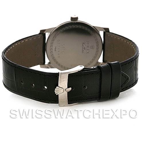 This image shows the backside of a Rolex Cellini 5116 White Gold Black Dial 5116 White Gold Black Dial watch, focusing on the leather strap and buckle.