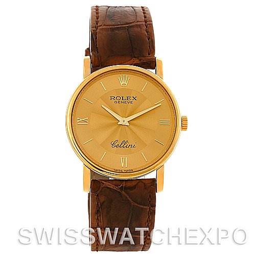 The image depicts a Rolex Cellini 5115 Men's Yellow Gold Champagne Dial 5115 Men's Yellow Gold Champagne Dial watch from a front angle, showing the dial, hour markers, and leather strap.