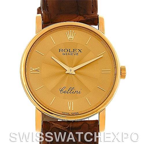This image shows a front view of a Rolex Cellini 5115 Men's Yellow Gold Champagne Dial 5115 Men's Yellow Gold Champagne Dial watch with a gold dial and brown leather strap.