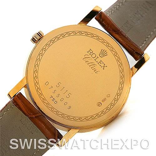 The image shows the back case of a Rolex Cellini 5115 Men's Yellow Gold Champagne Dial 5115 Men's Yellow Gold Champagne Dial watch, highlighting the model number and leather straps.
