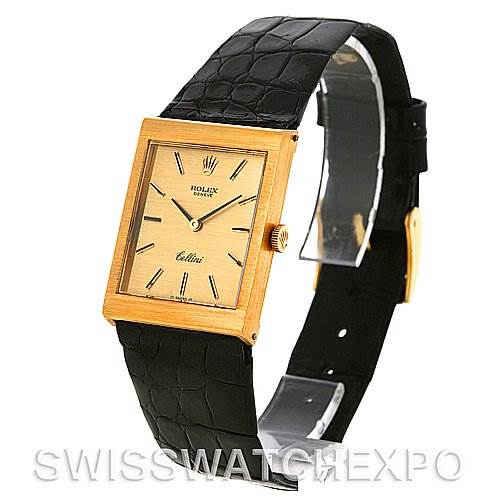 The image shows a Rolex Cellini 4014 Men's Yellow Gold Champagne Dial 4014 Men's Yellow Gold Champagne Dial watch at a three-quarter angle, highlighting its gold case, rectangular dial, black leather strap, and side crown.