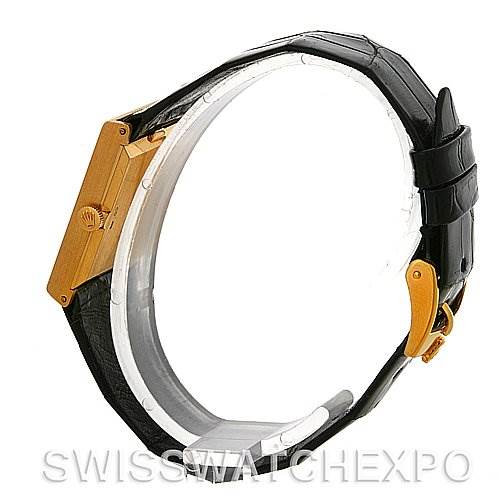 The image shows a side view of a Rolex Cellini 4014 Men's Yellow Gold Champagne Dial 4014 Men's Yellow Gold Champagne Dial watch, highlighting its gold case and black leather strap.