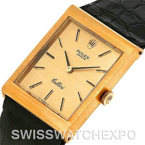 The image shows a close-up of the Rolex Cellini 4014 Men's Yellow Gold Champagne Dial 4014 Men's Yellow Gold Champagne Dial watch's rectangular face, gold case, crown, and part of the black leather strap.