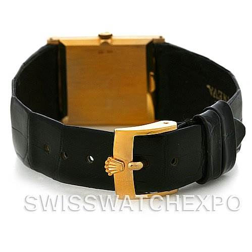 The image shows the back view of a Rolex Cellini 4014 Men's Yellow Gold Champagne Dial 4014 Men's Yellow Gold Champagne Dial watch, highlighting its black leather strap and gold buckle.