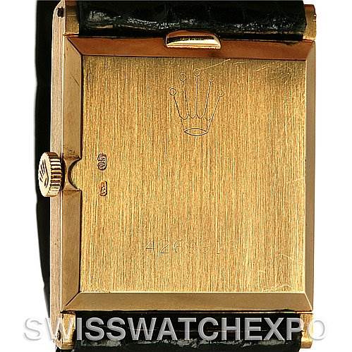 The image shows the back case of a Rolex Cellini 4014 Men's Yellow Gold Champagne Dial 4014 Men's Yellow Gold Champagne Dial watch, highlighting the crown logo and serial number.
