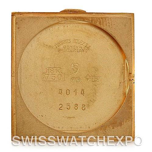 This is the back cover of the Rolex Cellini 4014 Men's Yellow Gold Champagne Dial 4014 Men's Yellow Gold Champagne Dial watch, displaying hallmark and model numbers.