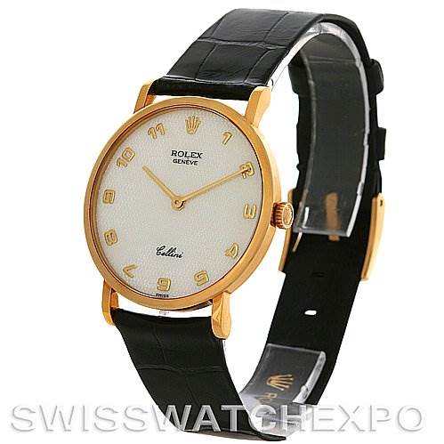 The image shows a Rolex Cellini 5112 Men's Yellow Gold Mother of Pearl Dial 5112 Men's Yellow Gold Mother of Pearl Dial watch at a slight angle highlighting the white dial, gold casing, and black leather strap.