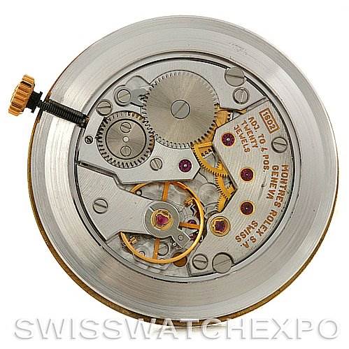 This image shows the internal mechanism of a Rolex Cellini 5112 Men's Yellow Gold Mother of Pearl Dial 5112 Men's Yellow Gold Mother of Pearl Dial watch, viewed from the back, exposing gears and components.