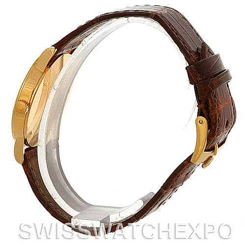 The image shows a side view of a Rolex Cellini 5115 Men's Yellow Gold Mother of Pearl Dial 5115 Men's Yellow Gold Mother of Pearl Dial watch featuring a brown leather strap and gold buckle.