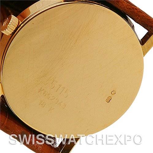 The image shows the back case of a Rolex Cellini 5115 Men's Yellow Gold Mother of Pearl Dial 5115 Men's Yellow Gold Mother of Pearl Dial watch, displaying the model number and other engravings.