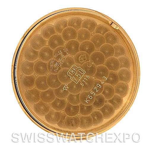 This image shows the case back of a Rolex Cellini 5115 Men's Yellow Gold Mother of Pearl Dial 5115 Men's Yellow Gold Mother of Pearl Dial model watch, highlighting the markings and engravings.