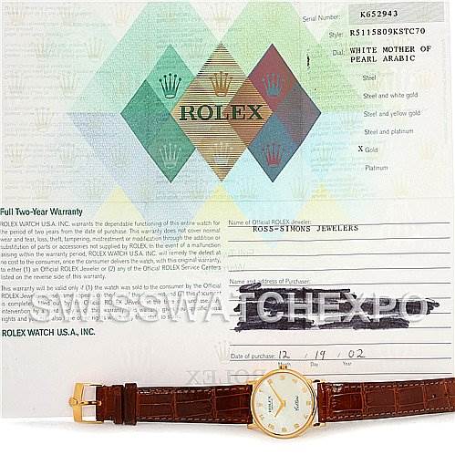 The image shows a Rolex Cellini 5115 Men's Yellow Gold Mother of Pearl Dial 5115 Men's Yellow Gold Mother of Pearl Dial watch laid flat next to its warranty card and purchase information, captured from an overhead angle.