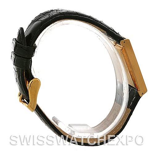 The image shows a side view of a Rolex Cellini 4014 Men's Yellow Gold Black Dial 4014 Men's Yellow Gold Black Dial watch, featuring the watch strap and gold case side.