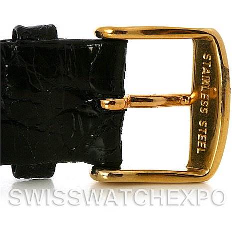 This image shows the gold-colored buckle and a portion of the black leather strap of a Rolex Cellini 4014 Men's Yellow Gold Black Dial 4014 Men's Yellow Gold Black Dial watch.