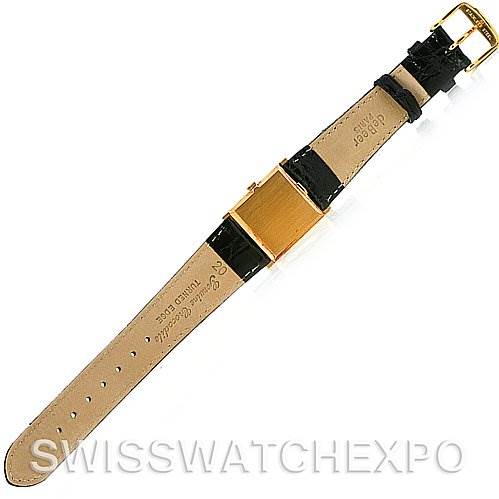 This image shows the back view of a Rolex Cellini 4014 Men's Yellow Gold Black Dial 4014 Men's Yellow Gold Black Dial watch, highlighting its leather strap and gold buckle.