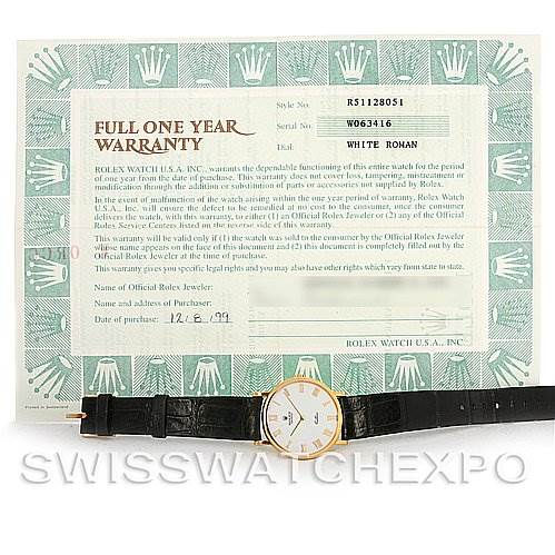 This image shows a Rolex Cellini 5112 Men's Yellow Gold White Dial 5112 Men's Yellow Gold White Dial watch with its full one-year warranty documentation.
