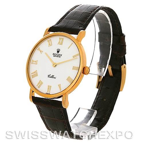The Rolex Cellini 5112 Men's Yellow Gold White Dial 5112 Men's Yellow Gold White Dial watch is shown from an angled front view, highlighting its round dial, gold casing, and black leather strap.