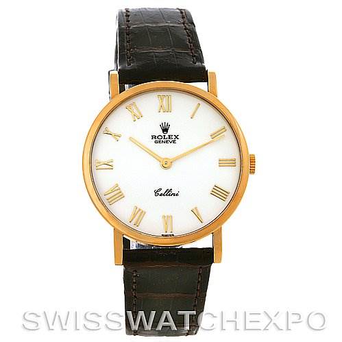 This Rolex Cellini 5112 Men's Yellow Gold White Dial 5112 Men's Yellow Gold White Dial watch is shown from a front angle, displaying its round dial, gold case, Roman numeral markers, and leather strap.