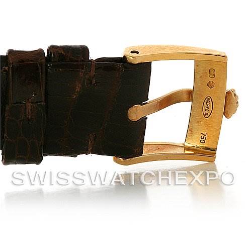 The image shows a close-up of the buckle and strap of a Rolex Cellini 5112 Men's Yellow Gold White Dial 5112 Men's Yellow Gold White Dial watch, focusing on the clasp and part of the band.