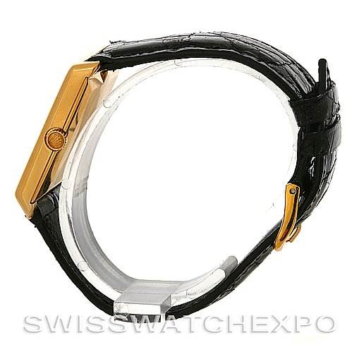 This image shows a side view of the Rolex Cellini 4105 Men's Yellow Gold Black Dial 4105 Men's Yellow Gold Black Dial watch, highlighting the crown, case, and black leather strap.