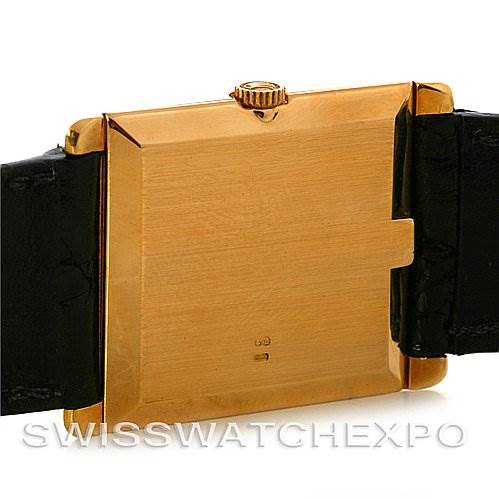 The image shows the back of the Rolex Cellini 4105 Men's Yellow Gold Black Dial 4105 Men's Yellow Gold Black Dial watch, including the caseback and crown, with part of the leather strap visible.