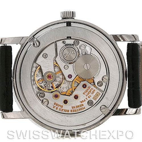 The image shows the back view of the Rolex Cellini 5115 Men's White Gold Grey Dial 5115 Men's White Gold Grey Dial watch, revealing its intricate movement and internal mechanics.
