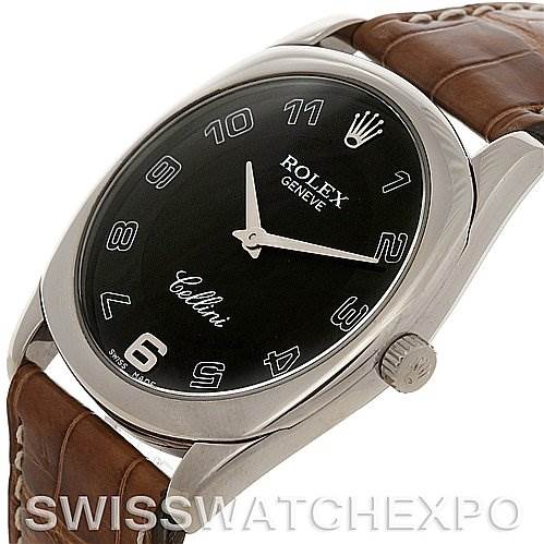 This image shows a Rolex Cellini 4233 Men's White Gold White Dial 4233 Men's White Gold White Dial watch at an angled view, highlighting the black dial, hour markers, crown, and brown leather strap.