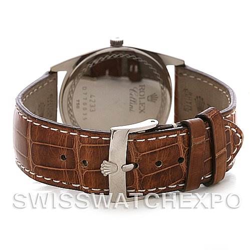 The image shows the back view of a Rolex Cellini 4233 Men's White Gold White Dial 4233 Men's White Gold White Dial watch displaying its brown leather strap and buckle.