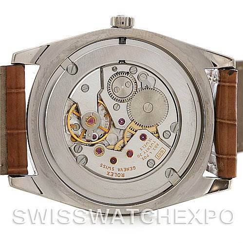 The image shows the back view of a Rolex Cellini 4233 Men's White Gold White Dial 4233 Men's White Gold White Dial watch, highlighting its movement and internal mechanisms.