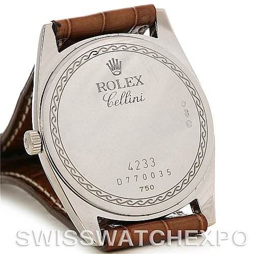 This image shows the back case of a Rolex Cellini 4233 Men's White Gold White Dial 4233 Men's White Gold White Dial watch, including the model name, serial number, and leather strap.