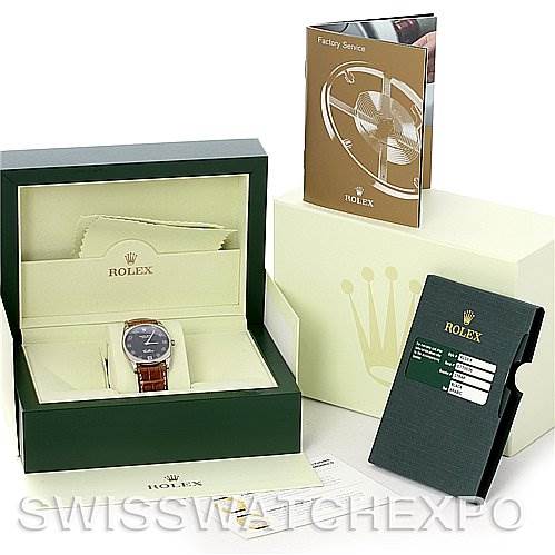 The image shows a Rolex Cellini 4233 Men's White Gold White Dial 4233 Men's White Gold White Dial watch, featuring its box, warranty card, and a factory service booklet from an angled view.