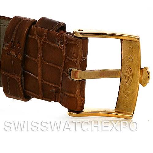 This image shows the buckle and part of the leather strap of a Rolex Cellini 5116 Men's Yellow Gold Black Dial 5116 Men's Yellow Gold Black Dial watch.
