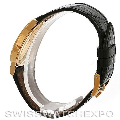 The image shows a Rolex Cellini 5115 Men's Yellow Gold Black Dial 5115 Men's Yellow Gold Black Dial watch from a side angle, highlighting the gold case and black leather strap.