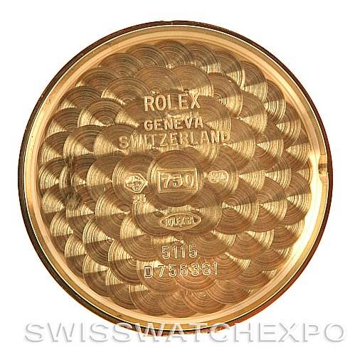 This image shows the interior of the case back of a Rolex Cellini 5115 Men's Yellow Gold Black Dial 5115 Men's Yellow Gold Black Dial watch, engraved with brand and model details.