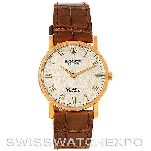The image shows a front view of a Rolex Cellini 5115 Men's Yellow Gold Beige Dial 5115 Men's Yellow Gold Beige Dial watch featuring a leather strap, gold case, and Roman numeral markers.