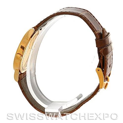 The image shows a side view of a Rolex Cellini 5115 Men's Yellow Gold Beige Dial 5115 Men's Yellow Gold Beige Dial watch, highlighting its brown leather strap and gold clasp.