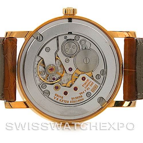 The image shows the back view of a Rolex Cellini 5115 Men's Yellow Gold Beige Dial 5115 Men's Yellow Gold Beige Dial watch, highlighting the exposed mechanical movement and components.