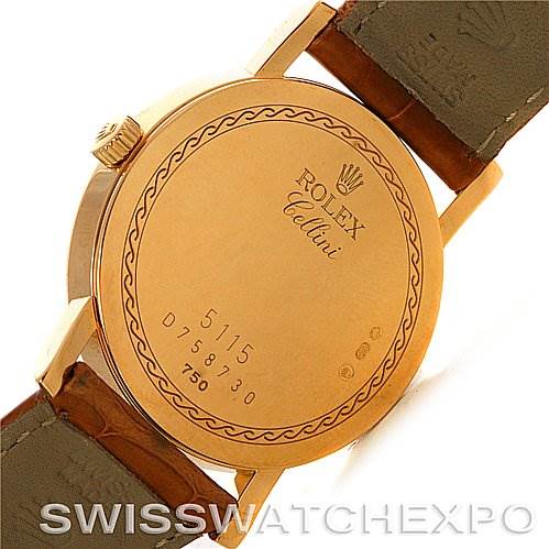 The image shows the back case of a Rolex Cellini 5115 Men's Yellow Gold Beige Dial 5115 Men's Yellow Gold Beige Dial watch, displaying the model number and intricate engravings.