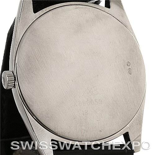 The image shows the back case of a Rolex Cellini 4233 Men's White Gold White Dial 4233 Men's White Gold White Dial watch from a slightly tilted angle, including the crown and strap lugs.