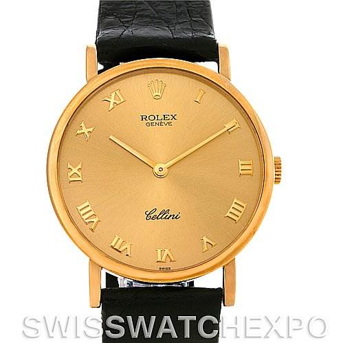 This image shows a front view of the Rolex Cellini 5112 Men
s Yellow Gold Champagne Dial 5112 Men
s Yellow Gold Champagne Dial watch with a gold case, Roman numeral markers, and a black leather strap.