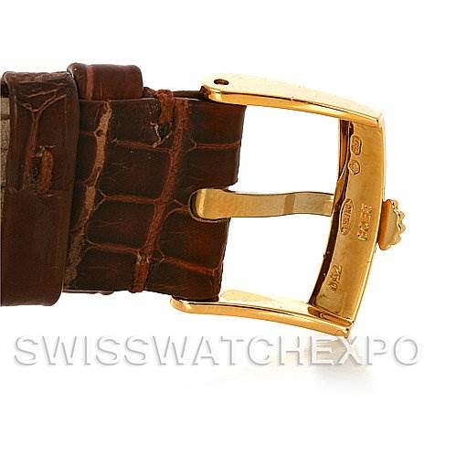 The image shows a close-up of the gold buckle and brown leather strap of a Rolex Cellini 5115 Men's Yellow Gold Silver Dial 5115 Men's Yellow Gold Silver Dial watch.